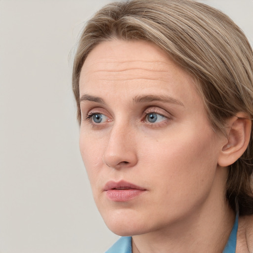 Neutral white young-adult female with medium  brown hair and blue eyes