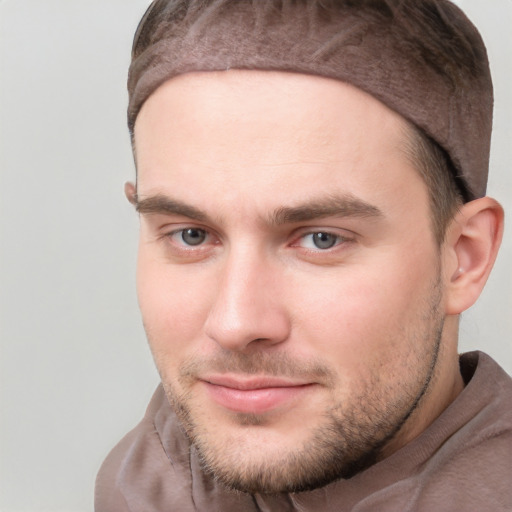 Neutral white young-adult male with short  brown hair and grey eyes