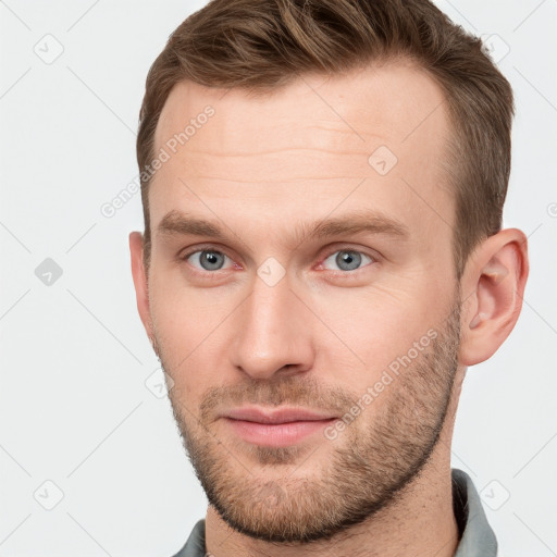 Neutral white young-adult male with short  brown hair and grey eyes