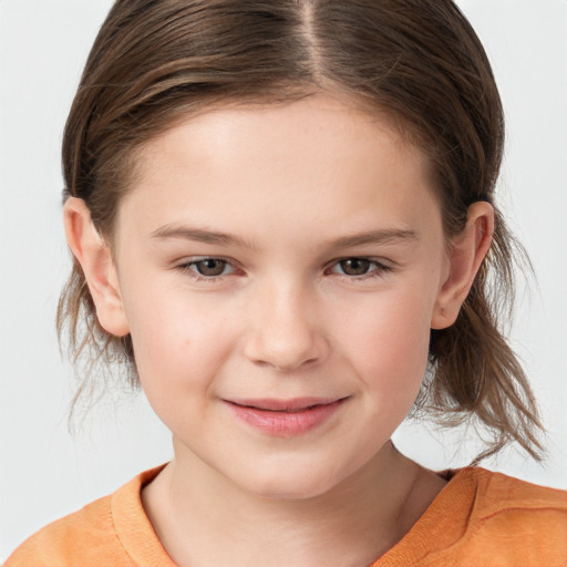 Joyful white child female with medium  brown hair and brown eyes