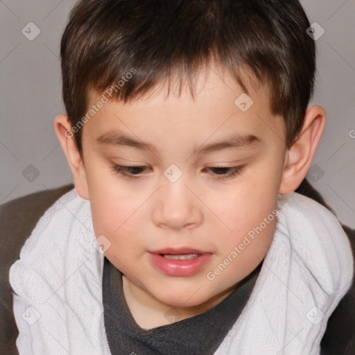 Joyful white child male with short  brown hair and brown eyes