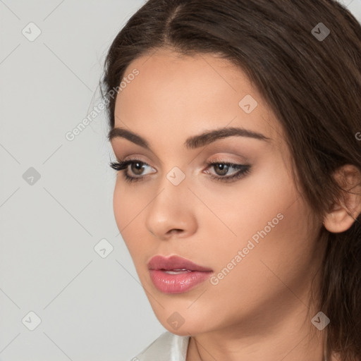 Neutral white young-adult female with long  brown hair and brown eyes