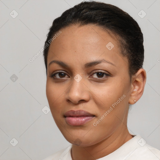 Joyful latino young-adult female with short  brown hair and brown eyes