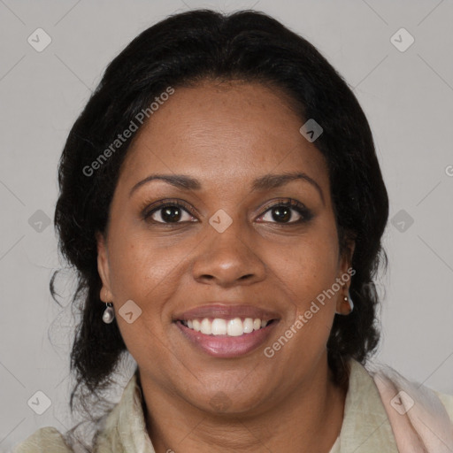 Joyful black young-adult female with medium  brown hair and brown eyes