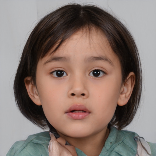 Neutral asian child female with medium  brown hair and brown eyes