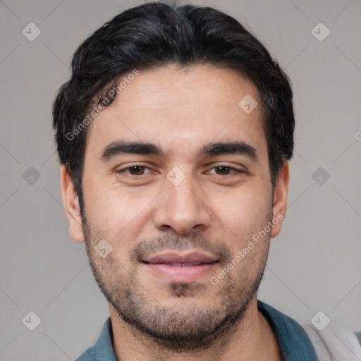 Joyful white young-adult male with short  black hair and brown eyes