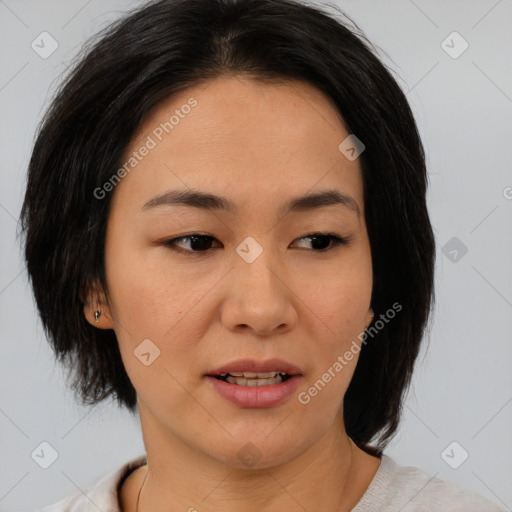 Joyful asian young-adult female with medium  black hair and brown eyes