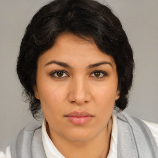 Neutral latino young-adult female with medium  brown hair and brown eyes