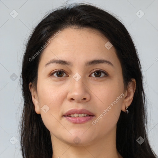 Joyful white young-adult female with long  brown hair and brown eyes