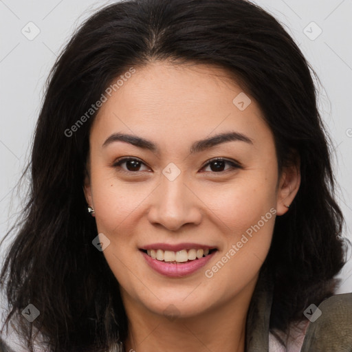 Joyful asian young-adult female with long  brown hair and brown eyes