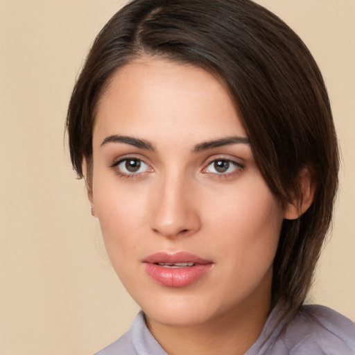 Neutral white young-adult female with medium  brown hair and brown eyes