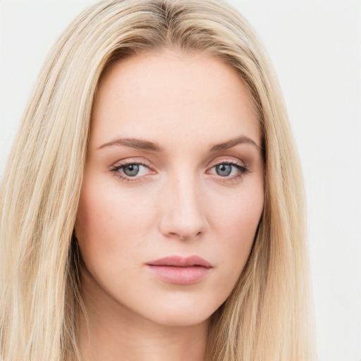 Neutral white young-adult female with long  brown hair and blue eyes