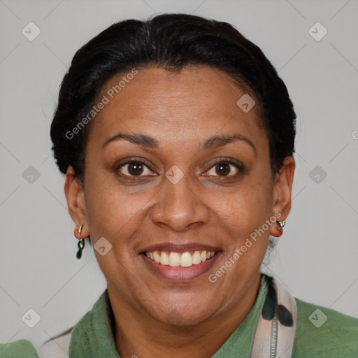 Joyful black adult female with short  brown hair and brown eyes