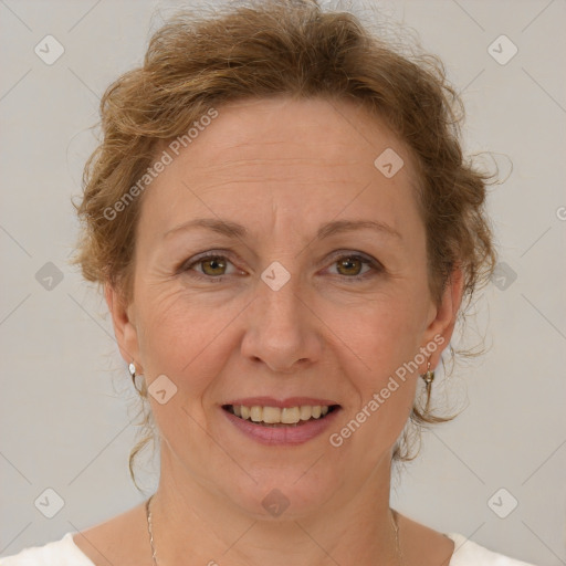 Joyful white adult female with short  brown hair and brown eyes