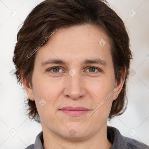 Joyful white adult female with short  brown hair and brown eyes