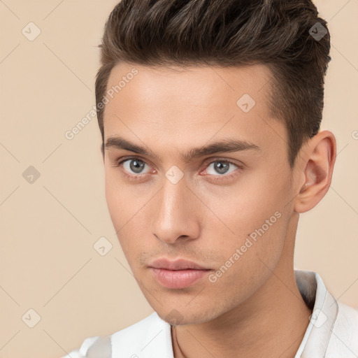 Neutral white young-adult male with short  brown hair and brown eyes