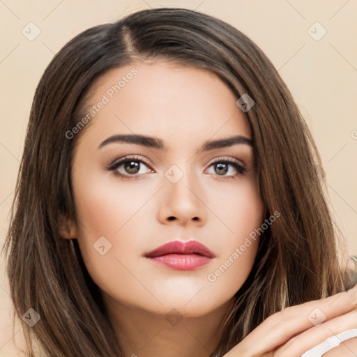 Neutral white young-adult female with long  brown hair and brown eyes