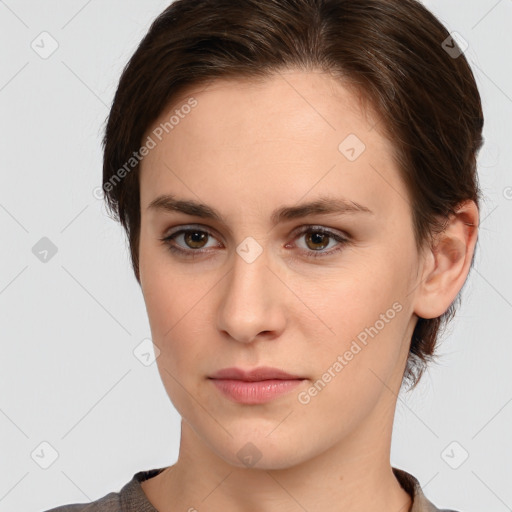 Neutral white young-adult female with short  brown hair and brown eyes