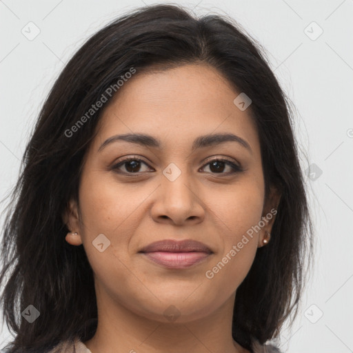 Joyful latino young-adult female with long  brown hair and brown eyes