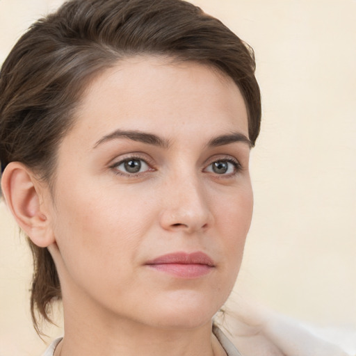 Neutral white young-adult female with medium  brown hair and brown eyes