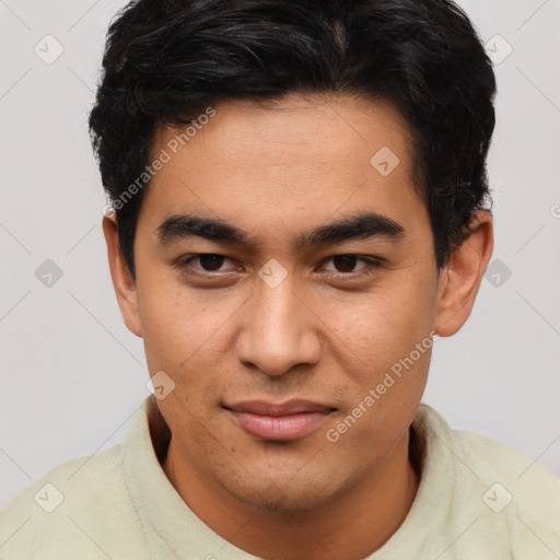 Joyful asian young-adult male with short  brown hair and brown eyes