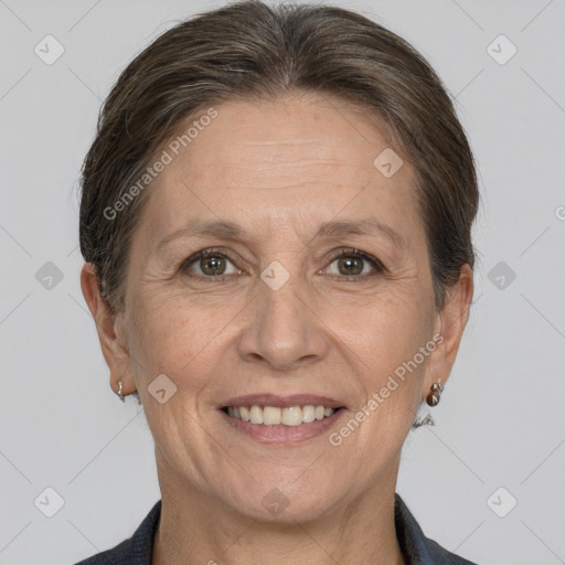 Joyful white adult female with medium  brown hair and grey eyes