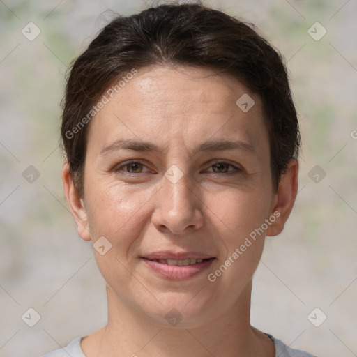 Joyful white adult female with short  brown hair and brown eyes