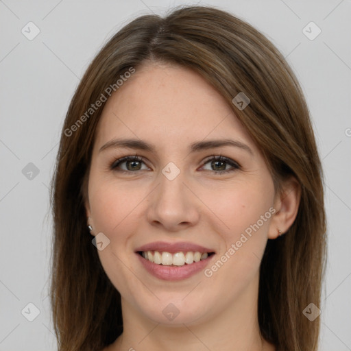 Joyful white young-adult female with long  brown hair and grey eyes