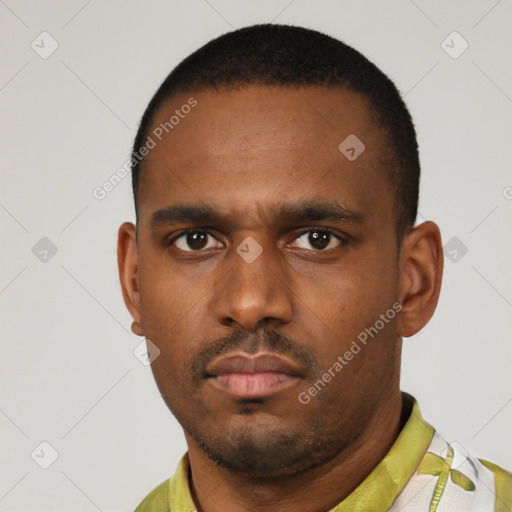 Neutral latino young-adult male with short  black hair and brown eyes