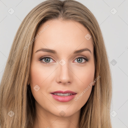 Joyful white young-adult female with long  brown hair and brown eyes