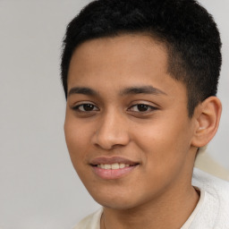 Joyful latino young-adult male with short  brown hair and brown eyes