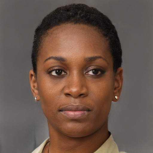 Neutral black young-adult female with short  brown hair and brown eyes