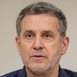 Neutral white middle-aged male with short  brown hair and brown eyes