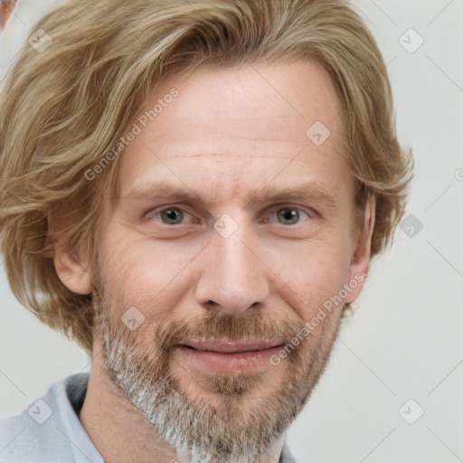 Joyful white adult male with short  brown hair and grey eyes