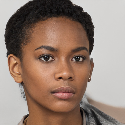 Neutral black young-adult female with short  brown hair and brown eyes