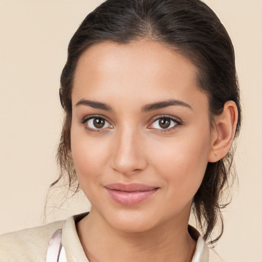 Joyful white young-adult female with medium  brown hair and brown eyes