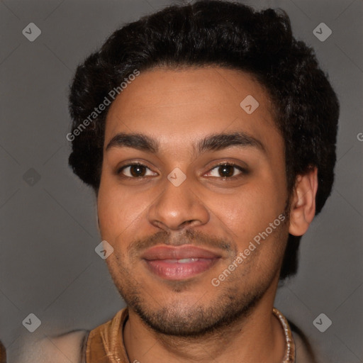 Joyful black young-adult male with short  brown hair and brown eyes