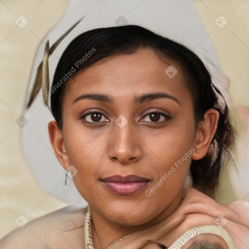 Joyful latino young-adult female with short  brown hair and brown eyes