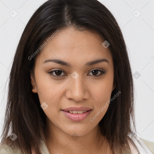 Joyful latino young-adult female with long  brown hair and brown eyes