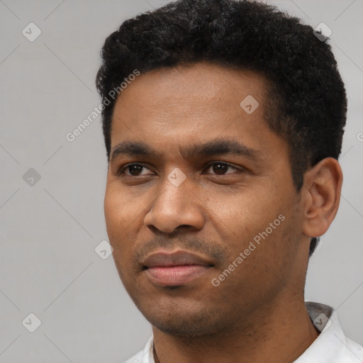 Neutral black young-adult male with short  black hair and brown eyes