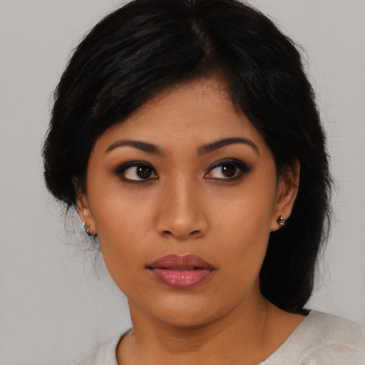 Neutral asian young-adult female with medium  black hair and brown eyes