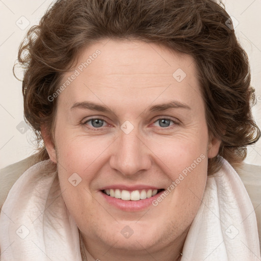 Joyful white young-adult female with medium  brown hair and blue eyes