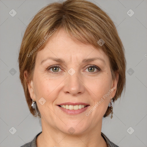 Joyful white adult female with medium  brown hair and grey eyes