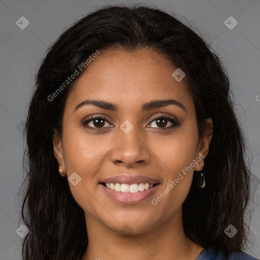 Joyful latino young-adult female with long  brown hair and brown eyes