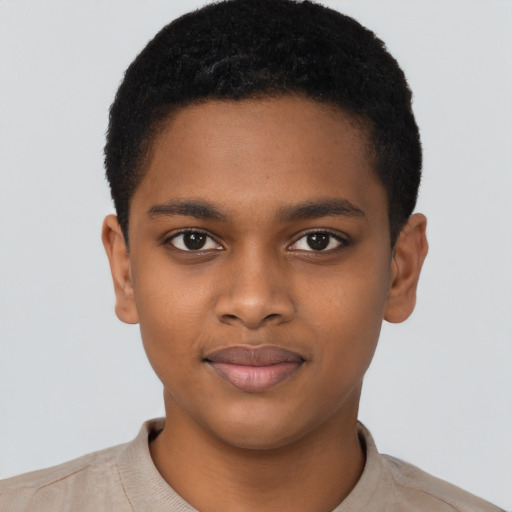 Joyful black young-adult male with short  brown hair and brown eyes