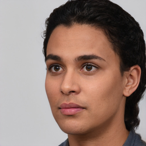 Neutral white young-adult female with short  black hair and brown eyes