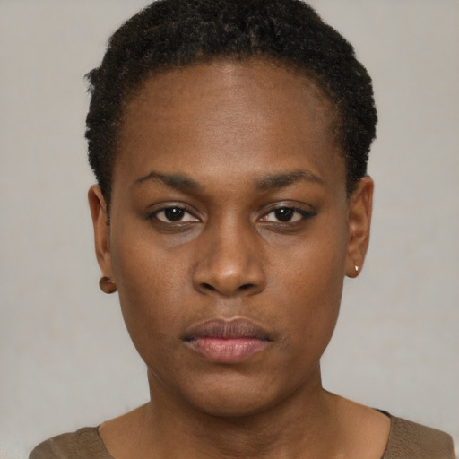 Neutral black young-adult female with short  brown hair and brown eyes