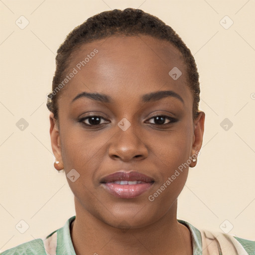 Joyful black young-adult female with short  brown hair and brown eyes