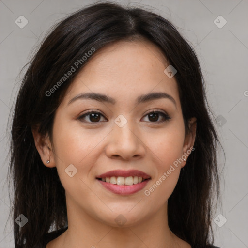 Joyful asian young-adult female with long  brown hair and brown eyes