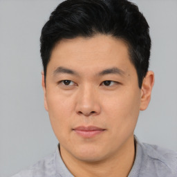 Neutral asian young-adult male with short  black hair and brown eyes